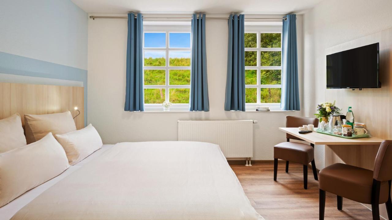 Hotel Deichinsel Шиллиг Экстерьер фото